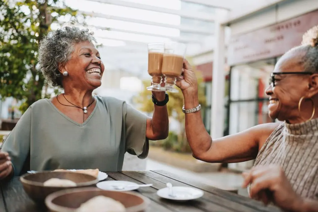 retired women meeting for coffee outside